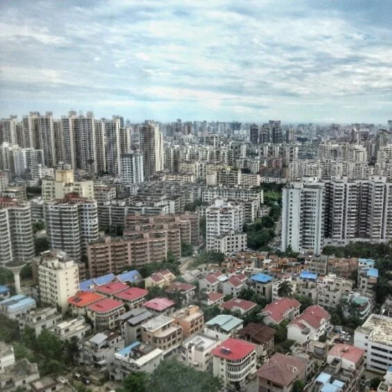 Haikou, Hainan — urban skyline and historic low-rise housing