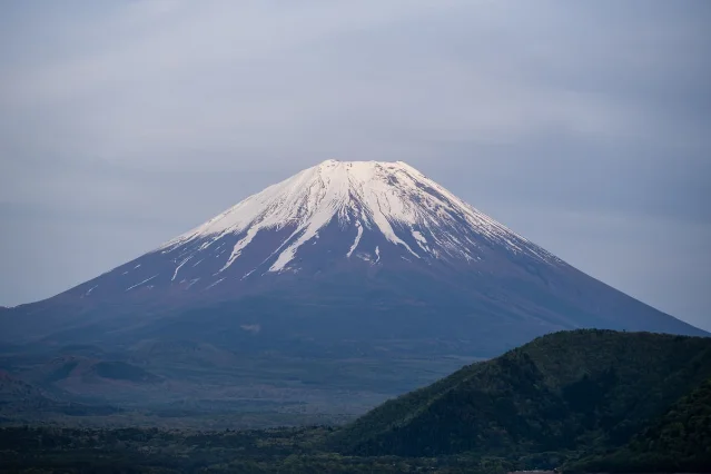 Snow-capped Mount Fuji under clear blue skies