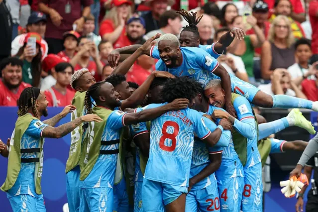 DR Congo players celebrate Yoane Wissa's equalizer