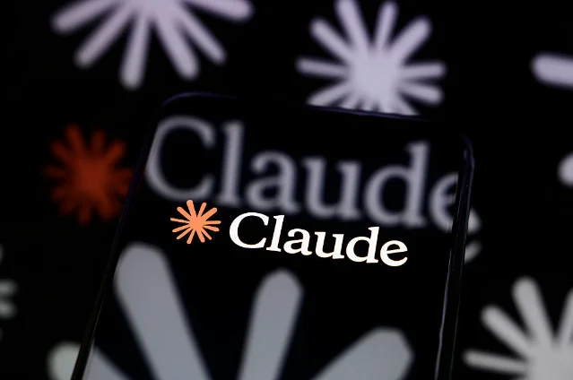 Claude logo on a smartphone screen reflected in a mirror surface