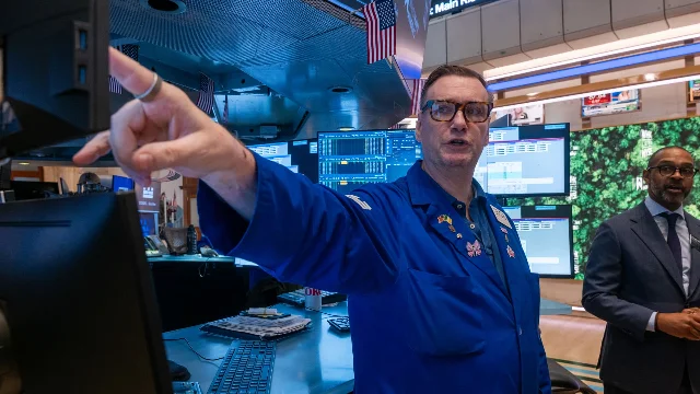 Traders on the NYSE floor as US stocks surged Thursday on Trump's Iran ceasefire announcement