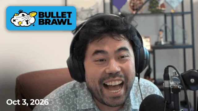 Hikaru Nakamura smiling in headphones during a broadcast