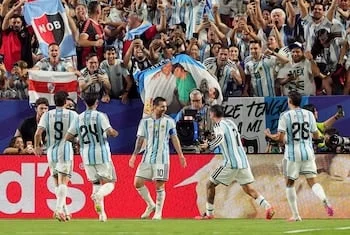 Messi celebrates with Argentina teammates