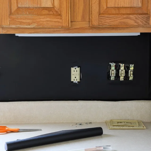 Black removable paper applied before tile