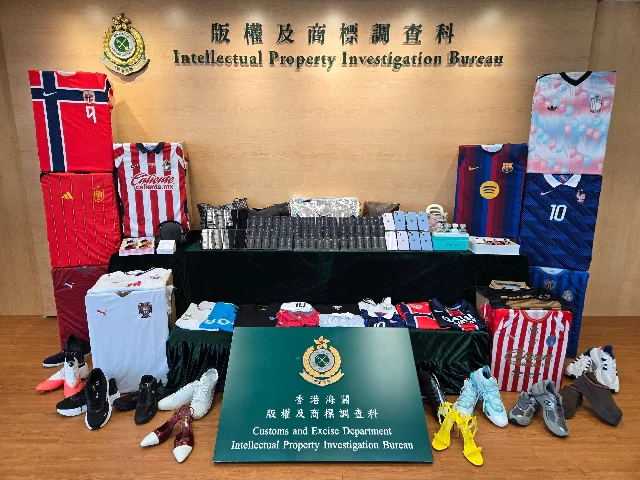 A display of suspected counterfeit goods seized in the cross-boundary operation.