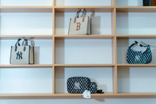 Handbags on shelves in retail display