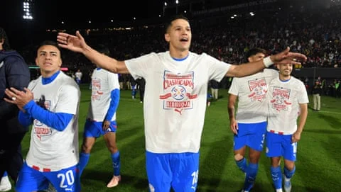 Álex Arce of Paraguay celebrates after qualifying for the World Cup