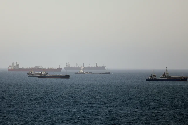 Tankers and cargo vessels in the Gulf of Oman along the Strait of Hormuz transit route, June 16, 2026