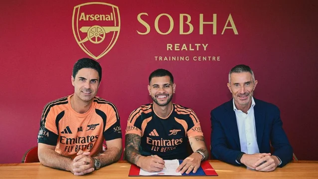 Bruno Guimarães signs for Arsenal at the club's training centre