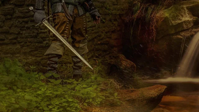 Witcher warrior in armour with silver sword, forest setting