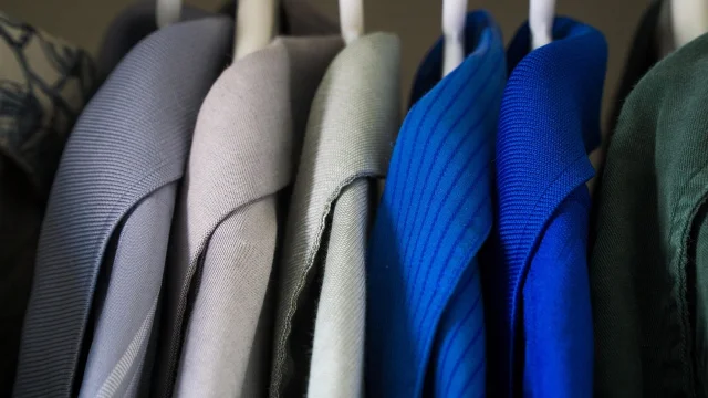 Close-up of shirts hanging in a closet