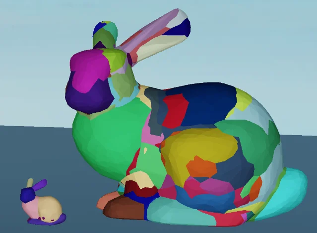 Two collision decompositions of the same mesh at different sizes, each convex shaded a different colour