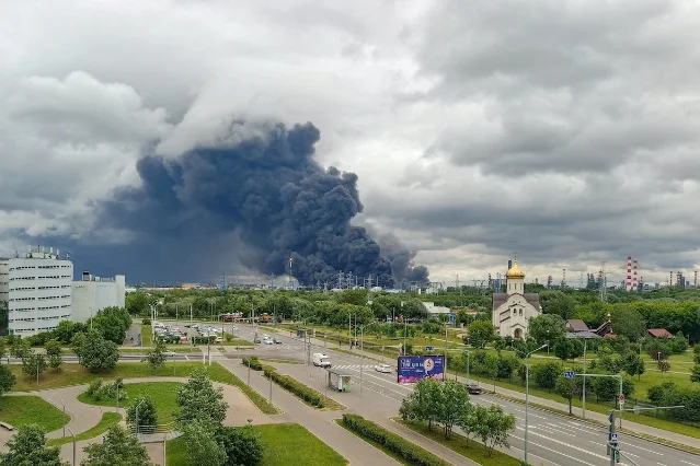 Smoke rises from a Moscow oil refinery