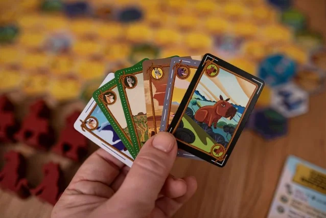 Fanned hand of multi-use cards in Hacienda 2026