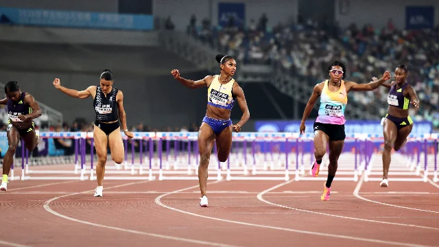 Masai Russell mid-race in 100m hurdles at Xiamen Diamond League 2026