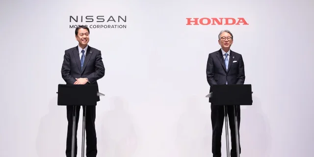Nissan and Honda executives at a joint press conference