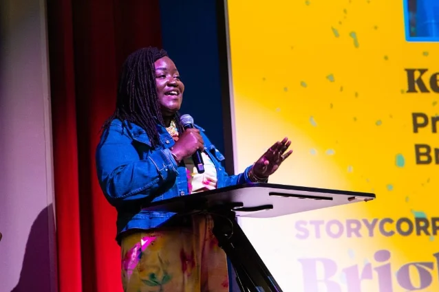 Latojia Dawkins speaks from the stage during the Birmingham Community Playback