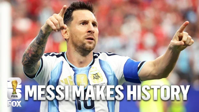 Lionel Messi celebrates the record goal