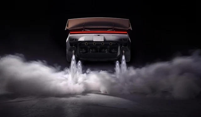The rear of a white Tesla Roadster with the rear wing raised, four round nozzles across the diffuser and jets of white gas firing at the ground