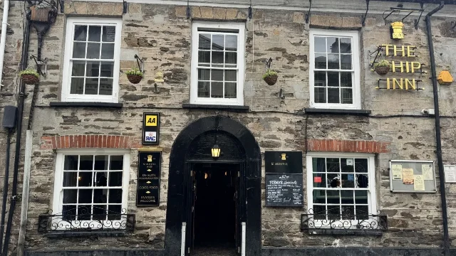 The Ship Inn facade after neighbors cleaned away the white paint.