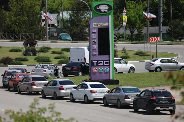 Cars queue at a petrol station in Simferopol