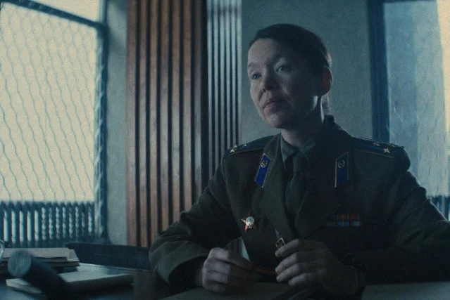 Anna Maxwell Martin as Lyudmilla Raskova in Star City Season 1 — seated at a Soviet-era desk in military uniform