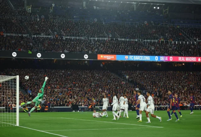 Marcus Rashford strikes the title-clinching free-kick past Thibaut Courtois
