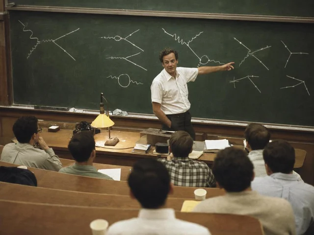A 1960s-era physicist at a chalkboard covered in particle interaction diagrams — the informal, hands-on energy Feynman brought to Caltech lectures