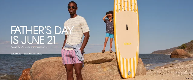 Bloomingdale's Father's Day promotion banner showing a man and child at the beach with a paddleboard, text reading "Father's Day is June 21"