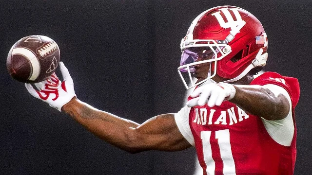 Indiana wide receiver Nick Marsh (No. 11) making a one-handed catch during spring practice