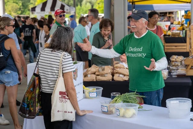 A table of produce set aside for the Meridian Market Gleaning Program