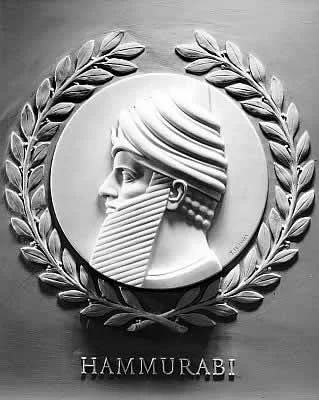 Marble bas-relief portrait of Hammurabi in the U.S. House of Representatives chamber, installed 1949–1950, one of 23 lawgivers depicted above the gallery doors