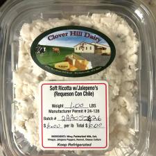 Recalled Clover Hill Dairy soft ricotta/requeson in a clear plastic container with handwritten label