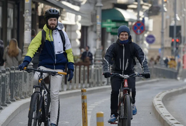 Cyclists in a city bike lane — on the road, a 50 lb eBike feels no different from a lighter bike thanks to motor assist
