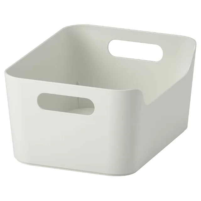 UPPDATERA storage box in light grey-green recycled polypropylene with oval carry handles — part of the 17-piece May 2026 drawer collection