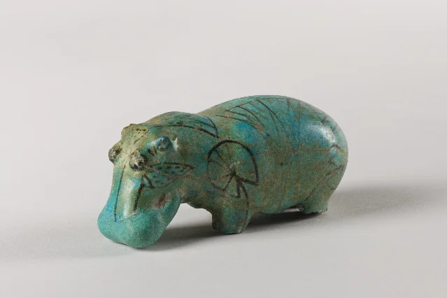Brooklyn Museum hippopotamus figurine (accession 35.1276), Dynasty 12–13, blue faience with lotus decoration, legs unrestored