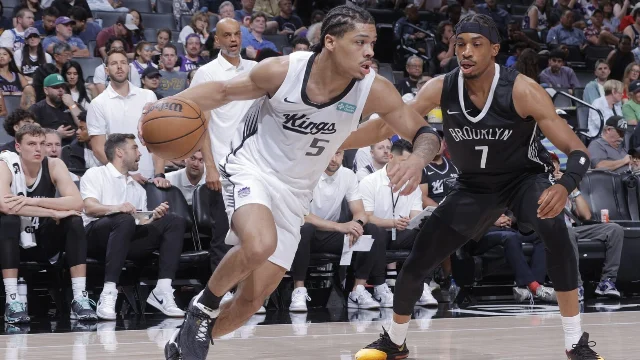 Darius Acuff Jr. attacks the Nets defense