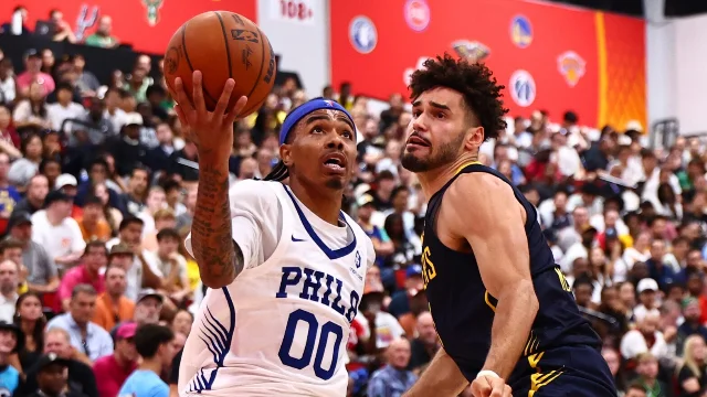 Labaron Philon attacks the rim for Philadelphia