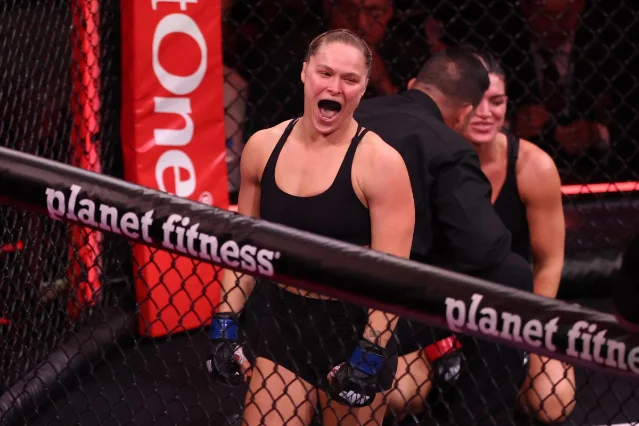 Ronda Rousey celebrates inside the cage after defeating Gina Carano via armbar at MVP MMA 1, May 16, 2026, Intuit Dome, Inglewood, CA
