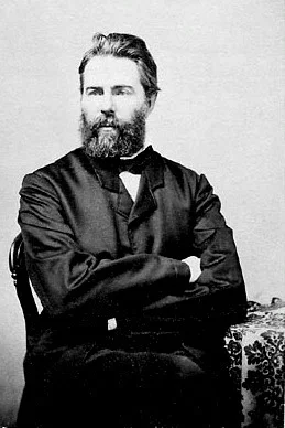 Melville seated, arms crossed, bearded, in formal Victorian dress