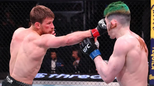 Arnold Allen punches Melquizael Costa in their featherweight bout at UFC Fight Night 276, May 16, 2026, Meta APEX, Las Vegas