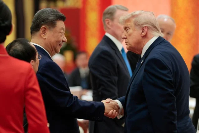 习近平与特朗普在北京人民大会堂国宴握手,2026 年 5 月 14 日
