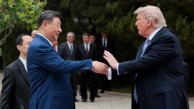 2026 年 5 月 15 日,特朗普访华行程结束,与习近平在中南海握手告别