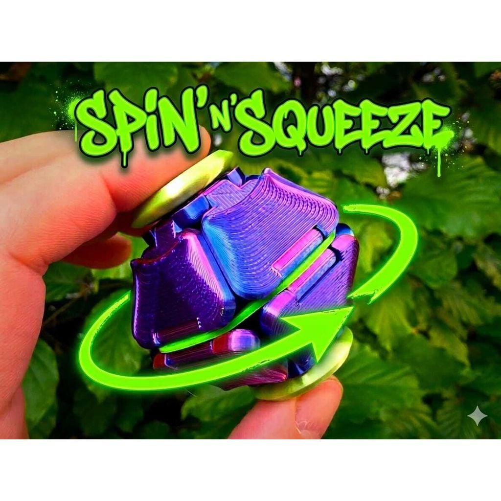 Spin'n'Squeeze Fidget Toy — iridescent body with lime-green spinner hubs held in hand
