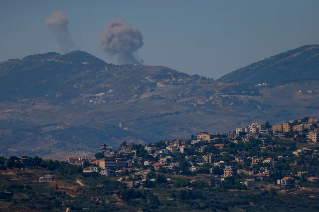 Smoke rises over southern Lebanese villages, viewed from northern Israel, as Israeli strikes continue on June 5–6