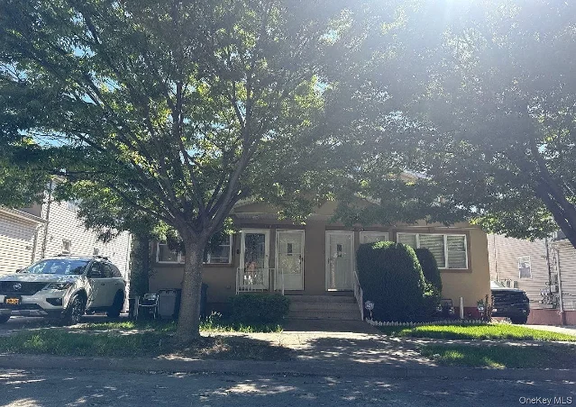 14033 Coombs St, Springfield Gardens, Queens — 5bd/2ba 2004 colonial duplex, OB $460K