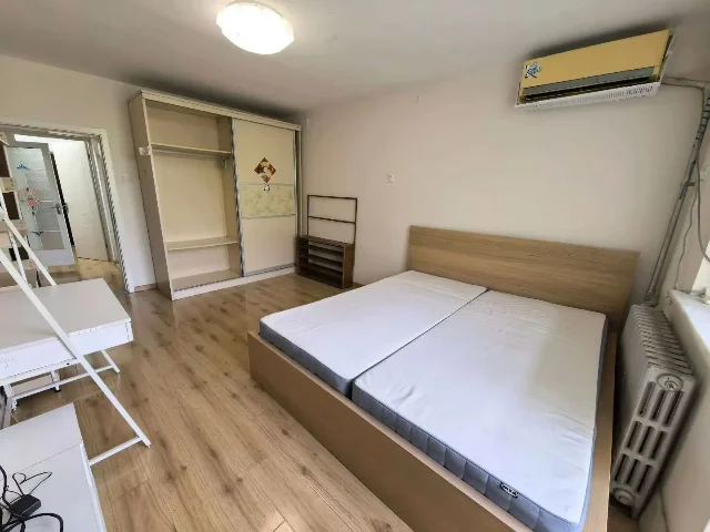 科源社区小一居卧室床侧视角