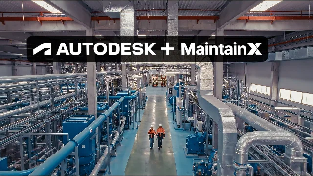 Industrial factory interior with two workers in hard hats; AUTODESK + MaintainX branding overlay