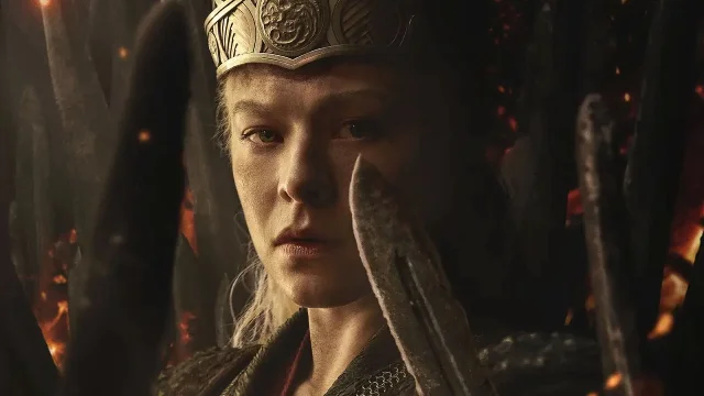 Emma D'Arcy as Rhaenyra Targaryen in House of the Dragon Season 3 — dramatic portrait with crown, fire and dragon claws in background
