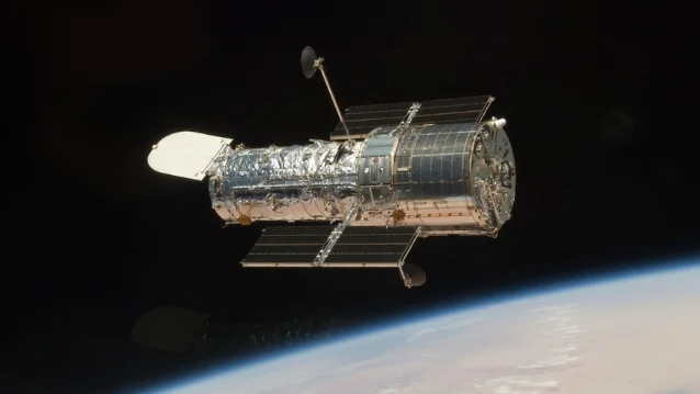 Hubble released from Atlantis's payload bay on May 19, 2009, following SM4 — the telescope in its final hardware configuration